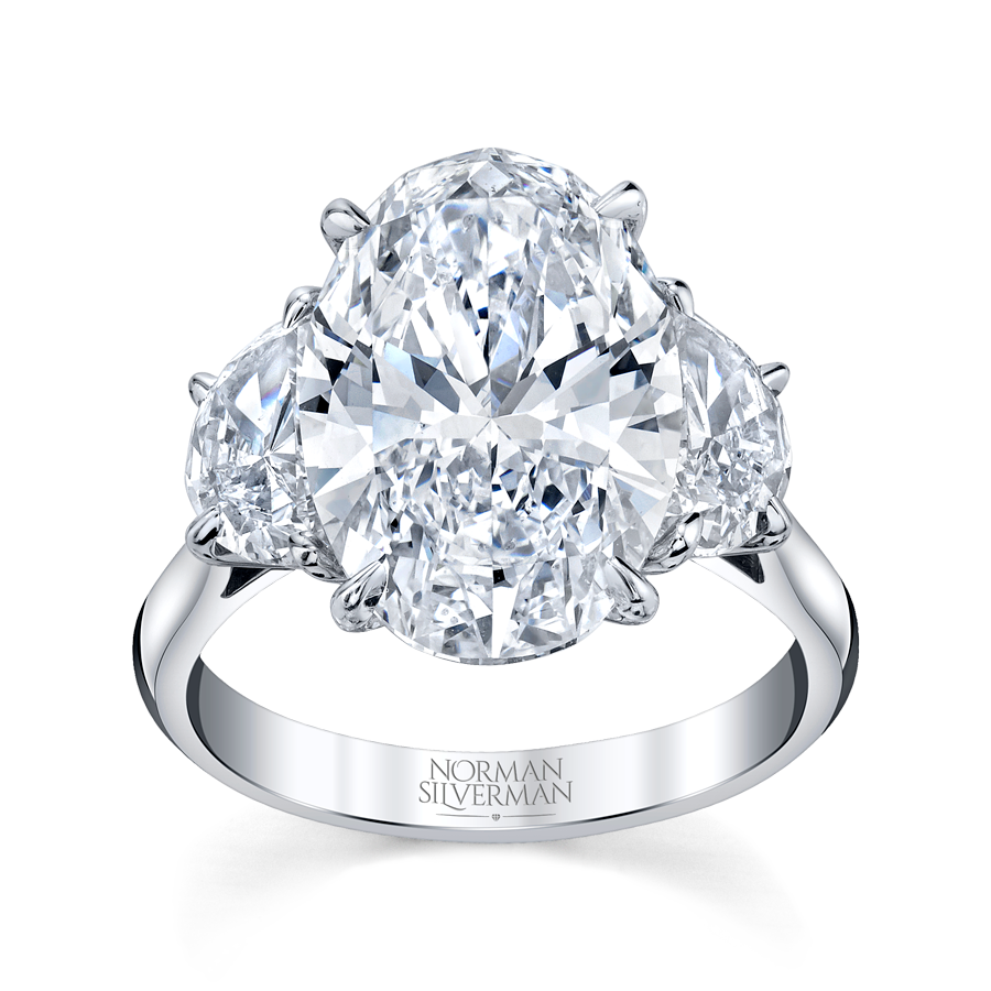 6.05 Carat Platinum Oval-Cut with 2 Half-Moon Shaped Diamond Ring