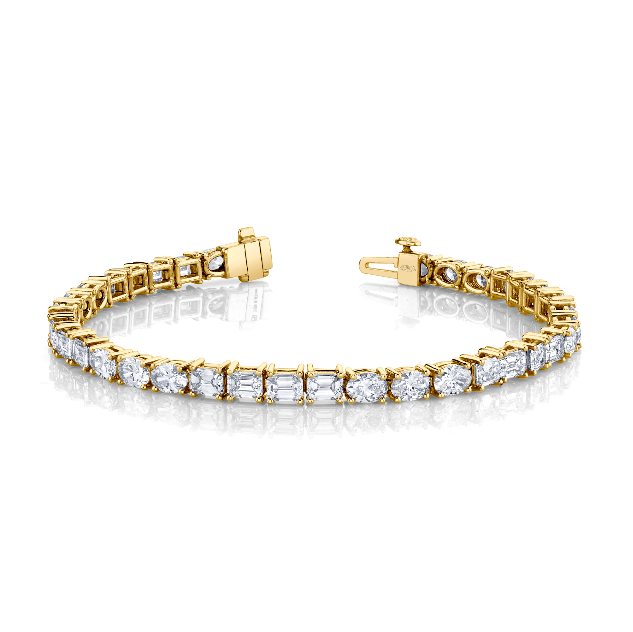 9.61 Carat 18k White Gold East-West Emerald and Oval Cut Bracelet
