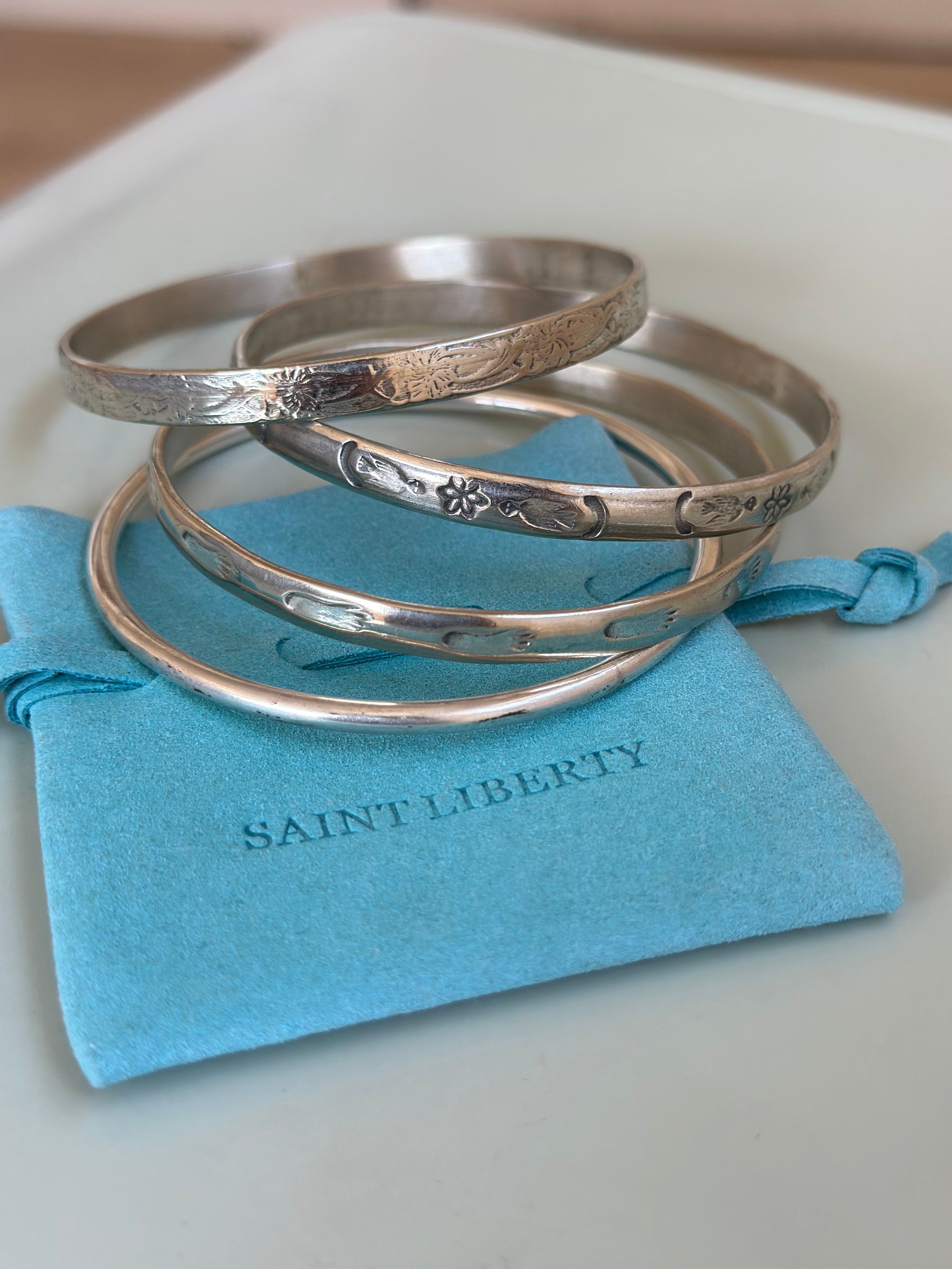 Stack of 4 Mexican Silver Bracelets